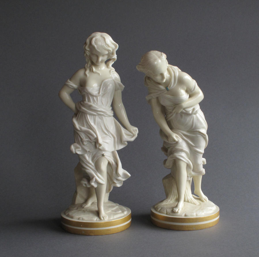 A pair of glazed Worcester Parian figures