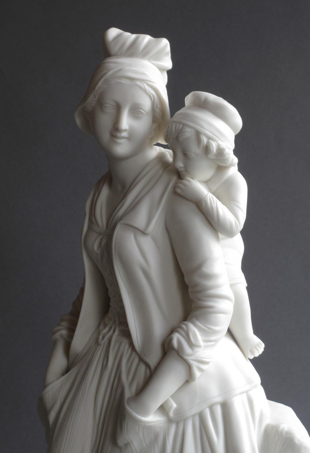 A Parian figure of a mother and child