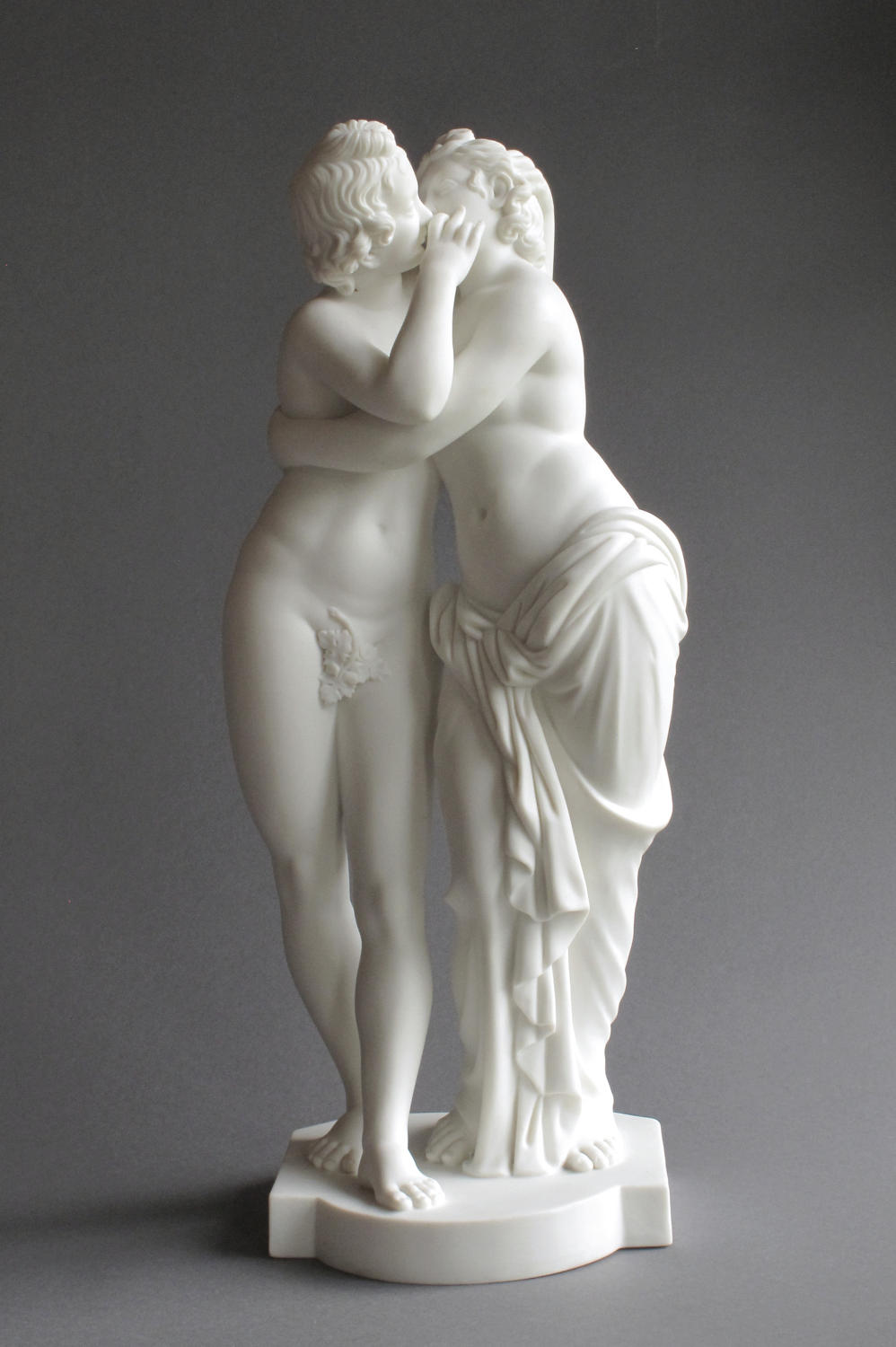 A Minton Parian figure group of Cupid and Psyche