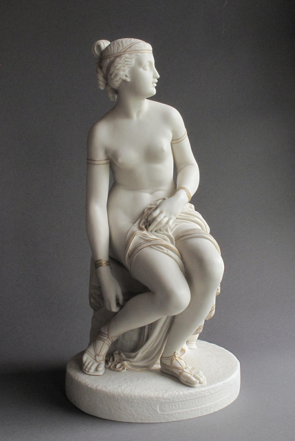 A Copeland Parian figure of a Nymph untying her Sandal