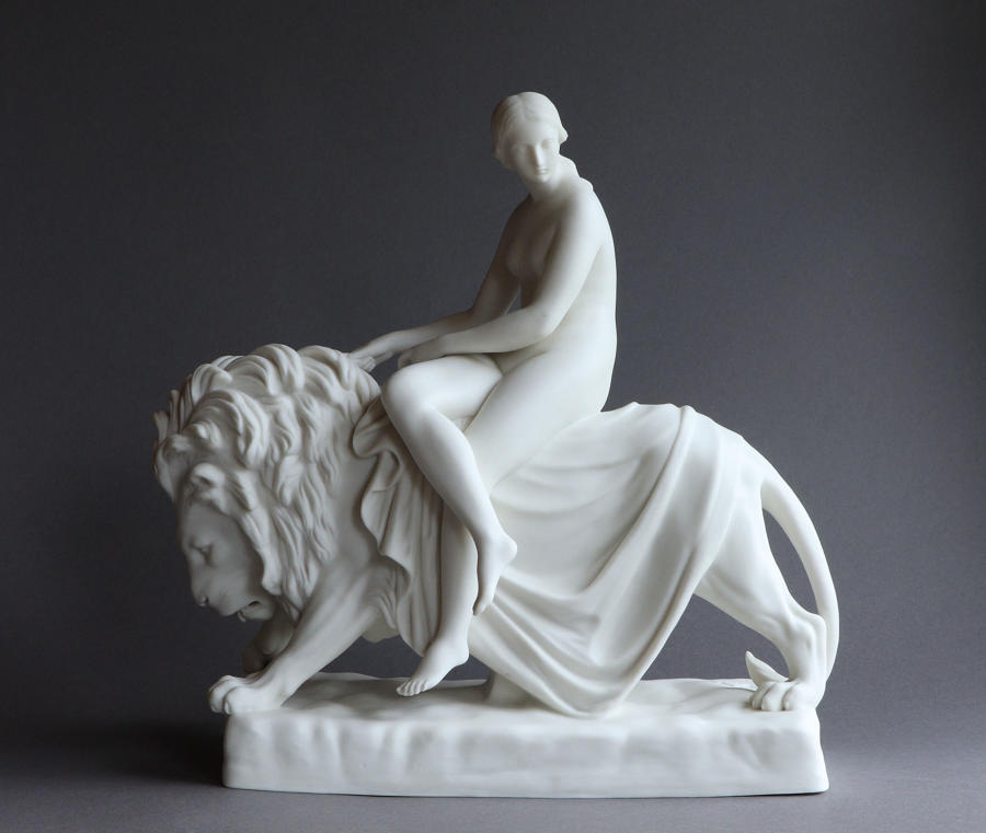 A Minton Parian figure of Una and the Lion