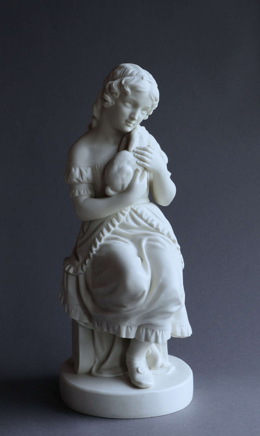 A Copeland Parian figure of “The Pets” or “Girl with Rabbit”