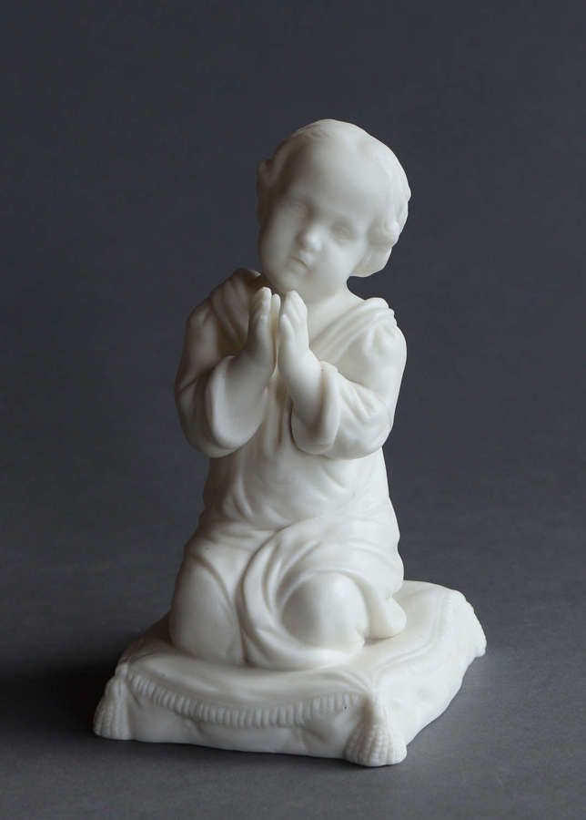 A small Parian figure of the infant Samuel