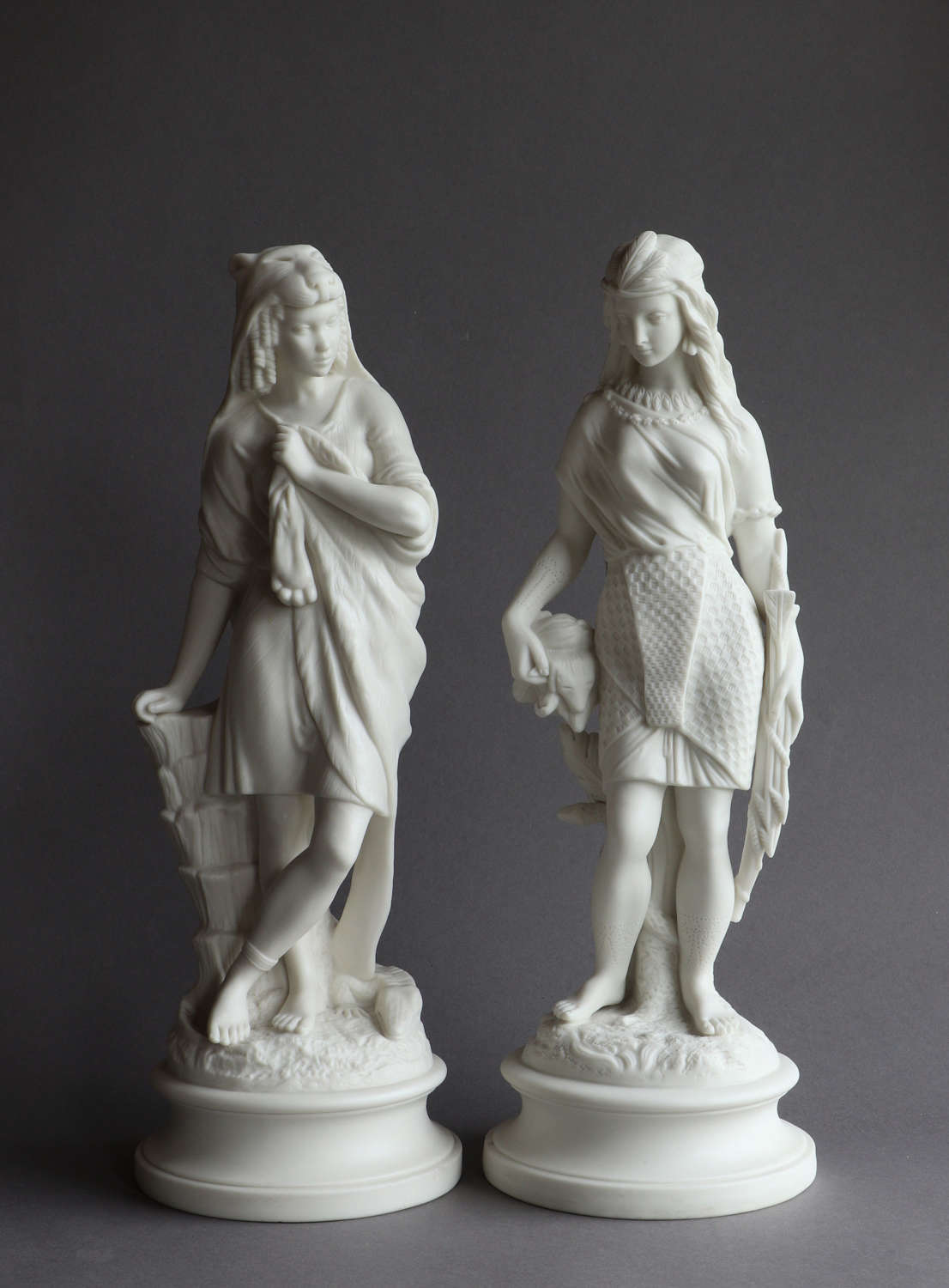 Two Parian figures by Robinson & Leadbeater of Africa & The Americas