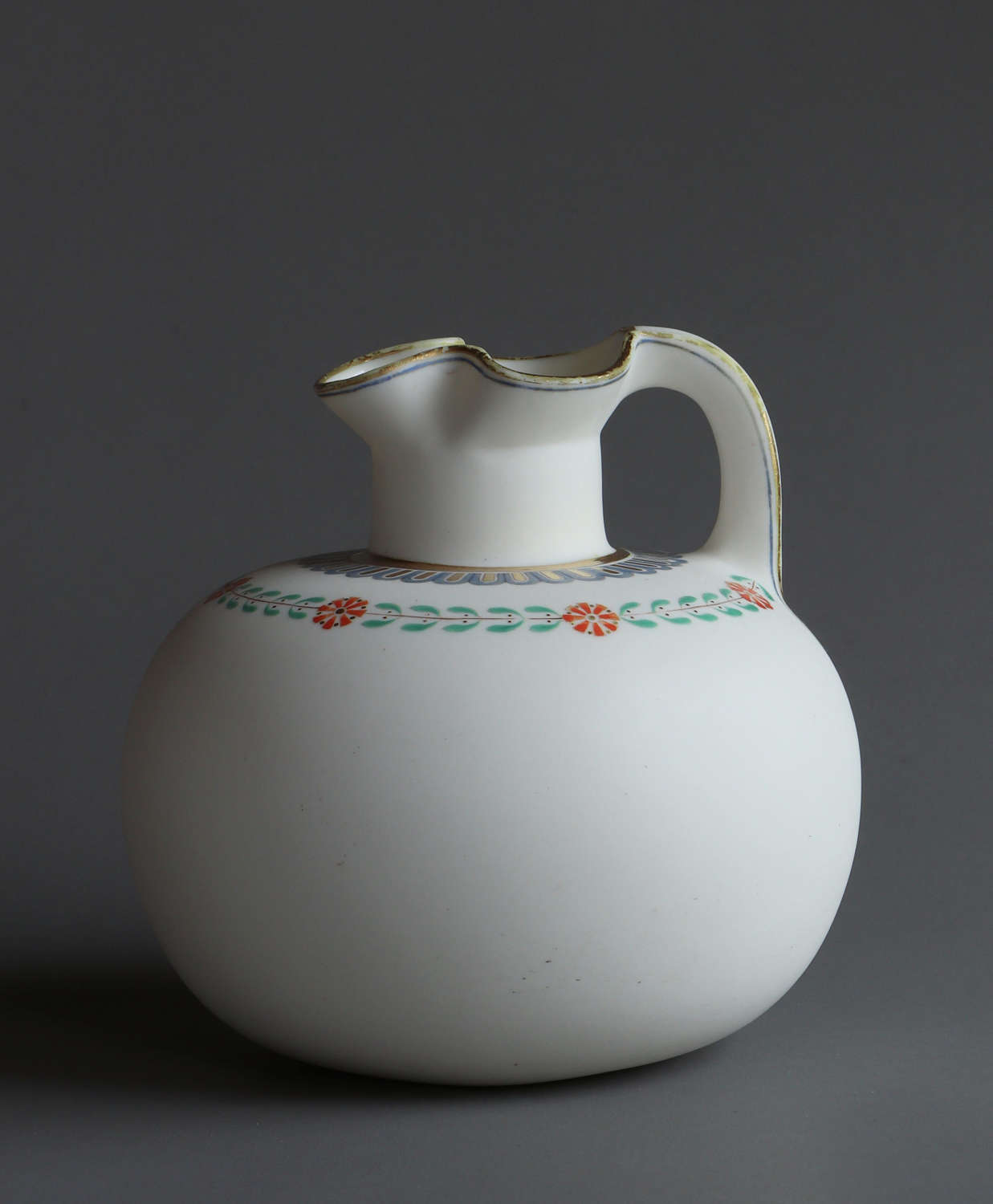 A charming compressed form Parian jug or pitcher