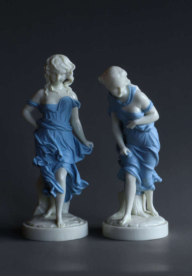 A pair of blue Worcester Parian figures: Before and Against the Wind