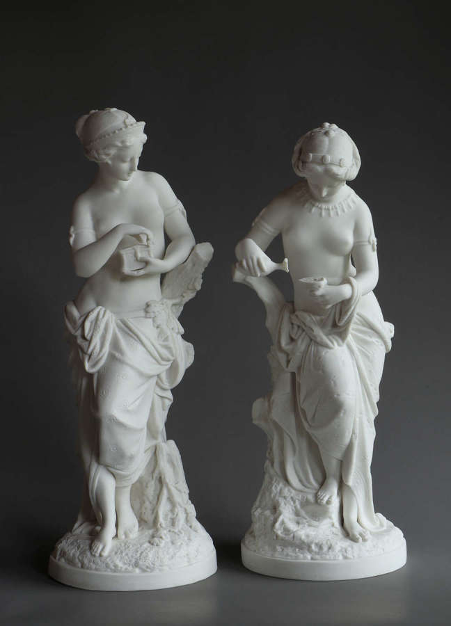 A pair of Parian figures of Pandora and Psyche by Minton
