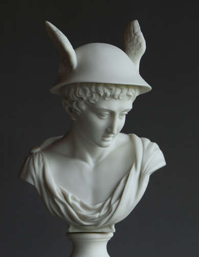 A fine Parian bust of Mercury on a fluted column