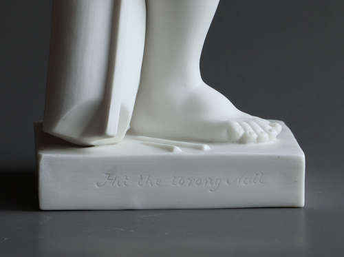 Parian figure of The Little Boat Builder ('Hit the Wrong Nail')
