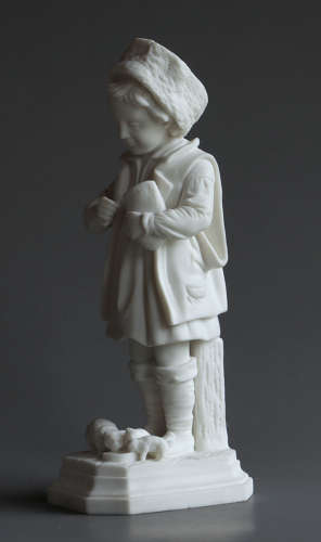 A Parian figure of a child feeding their pet cat and kittens