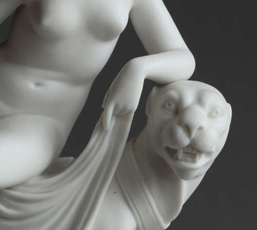 A small Parian figure of Ariadne and the Panther