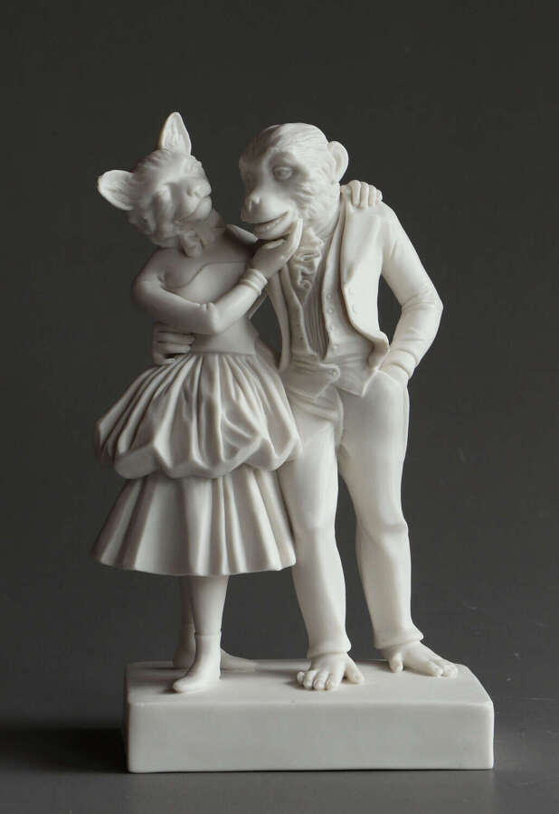 A rare Coalport Parian group of a cat and monkey