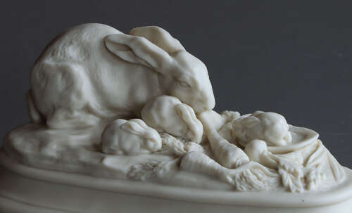 A charming small Copeland Parian group of a family of rabbits