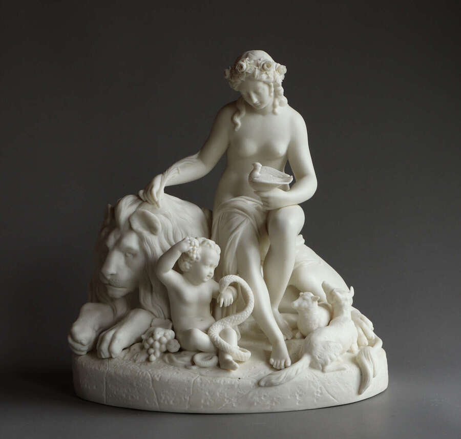 A fine and uncommon Parian figure group of 'The Golden Age'